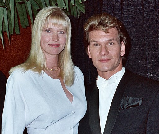 Patrick and Lisa Niemi at an event, dressed formally, exuding timeless love and partnership.
